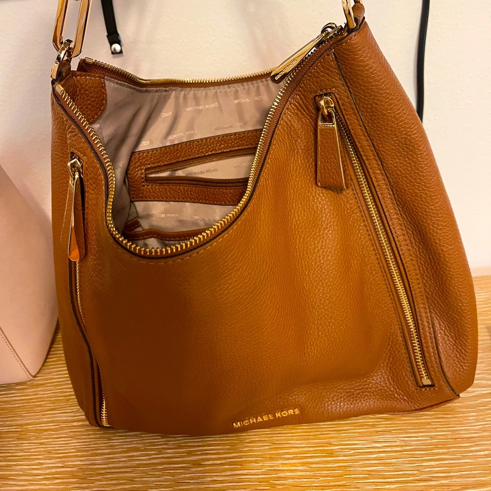 This is an authentic Michael Kors shoulder bag.